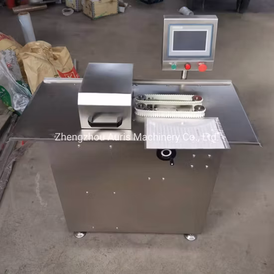 ハム充填後のキンクソーセージ自動結束機